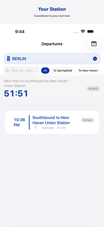 Station departure board with live countdown and delay badges